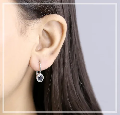 Vista 2 de Dazzlingrock Collection Pendientes colgantes de oro blanco de 10 quilates, 0.236 x 0.157in, cada centro de corte ovalado y diamante redondo lateral