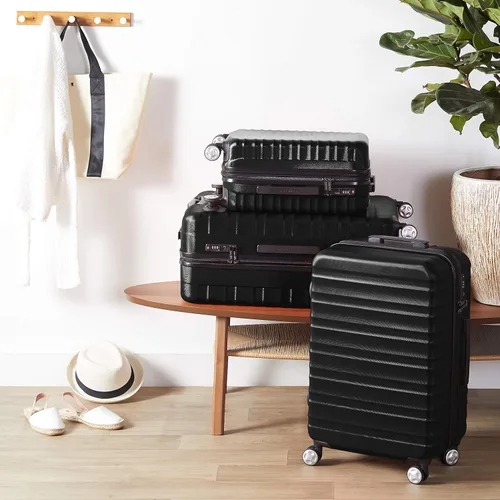 Vista 7 de Tienda Basics Maleta giratoria rígida con ruedas, Negro, Juego de 2 piezas (20 pulgadas, 28 pulgadas)