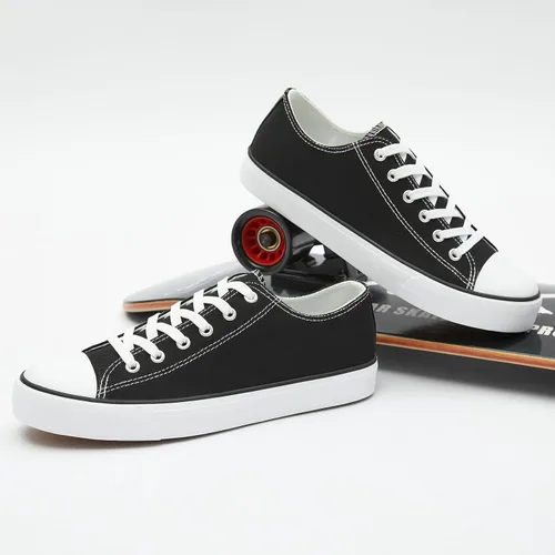 Vista 4 de yageyan Zapatos bajos de lona para hombre Zapatillas casuales clásicas Zapatos de moda en blanco y negro