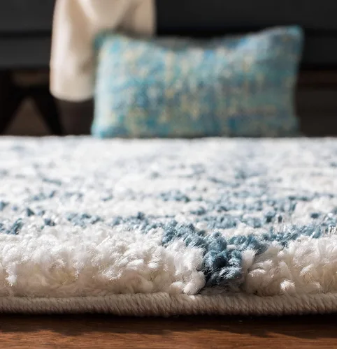 Vista 3 de SAFAVIEH Berber Fringe Shag Collection - Alfombra decorativa de 2 pies 2 pulgadas x 4 pies, color crema y azul, diseño, no desprende pelusa
