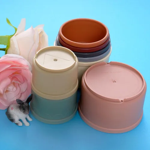 Vista 6 de 8 tazas apilables para conejos, juguetes de conejito multicolor de diferentes tamaños, vasos anidables para animales pequeños que ocultan comida