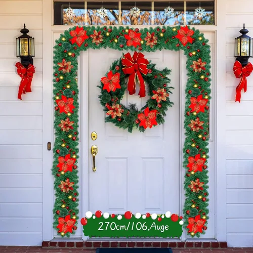Vista 5 de Guirnalda de Navidad artificial preiluminada, ratán verde con decoraciones de flores rojas y luces LED que funcionan con pilas para escaleras