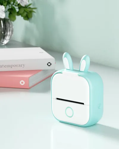 Vista 9 de Memoking T02 - Funda protectora con forma de orejas de conejo, silicona suave, sin BPA, lindo diseño de impresora, compatible con T02 Mini Bluetooth
