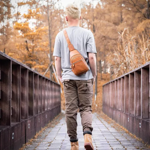 Vista 7 de Bolso bandolera de cuero genuino para hombres y mujeres, bolso de hombro cruzado, mochila de pecho, bolso de mano casual
