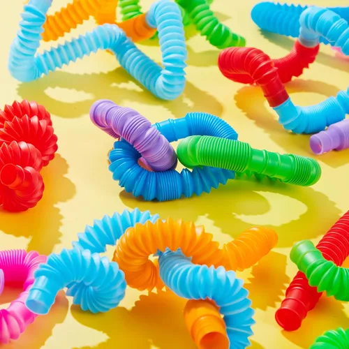 Vista 8 de JOYIN Paquete de 18 Pop Tubes, Juguetes Sensoriales (Pequeños) Juguetes Fidget Recuerdos de Fiesta - 9 Colores, Aprendizaje Creativo y Diversión
