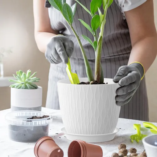 Vista 4 de WSMKSZ Macetas de 7 pulgadas, paquete de 5 macetas con agujeros de drenaje y platillos para plantas de interior, macetas de plástico con ondas
