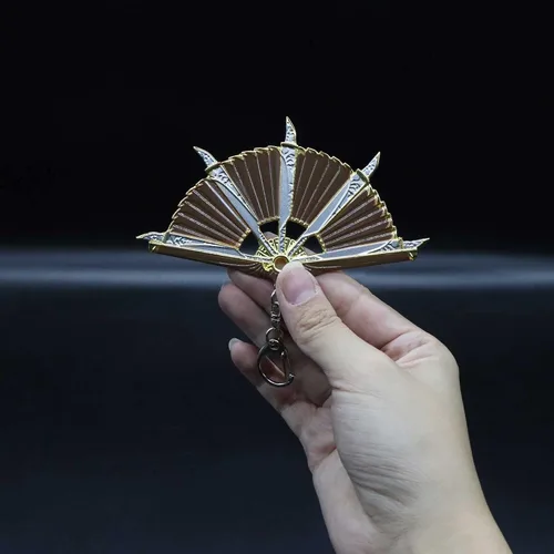 Vista 9 de crafthand Llavero de metal Loba Heirloom Mini Fan Metal Colgante Figura Decoración de Escritorio Mochila Colgante Suministros de Fiesta Regalo, Oro