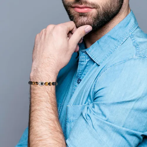 Vista 2 de Pulsera Hamsa con cuentas de piedra de tigre de ónix