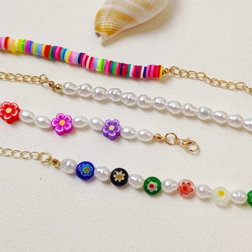 Vista 2 de Collares largos de perlas para mujeres y hombres, multicapa de perlas de imitación de color blanco crema