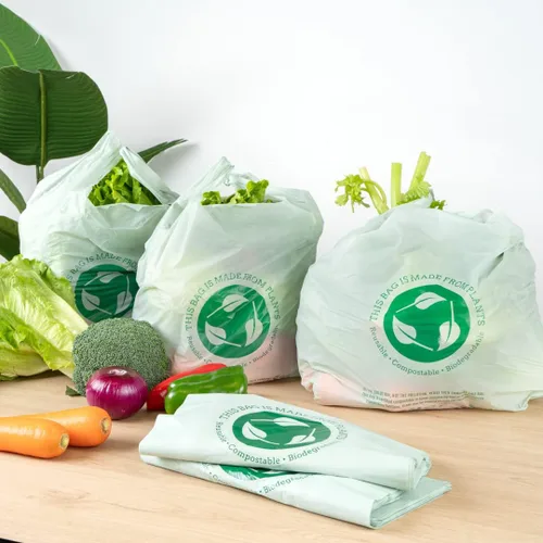 Vista 8 de Restaurantware -Bolsas de comestibles de tamaño 1/6, 100 bolsas de plástico duraderas - Asas de camiseta, bolsa de compras de plástico verde de alta
