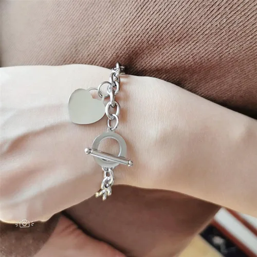 Vista 4 de CHUU YUNG Elegent - Pulsera de acero inoxidable con dije de corazón con cierre de palanca, chapado en oro y plata, cierre de OT, pulsera de cadena