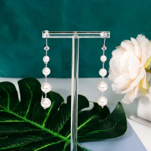 Vista 6 de Aretes largos de perlas para mujer, chapados en oro de 14 quilates, hipoalergénicos, elegantes aretes de borla de perlas doradas para niñas, Oro