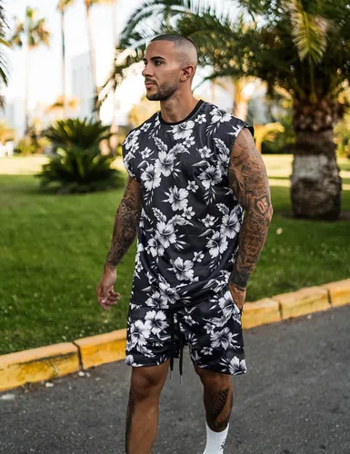 Vista 2 de AstoSeu Conjunto hawaiano casual sin mangas de 2 piezas para hombre, camisa de flores