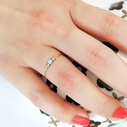 Vista 2 de Anillo de ansiedad anti estrés oro alivio del estrés Fidget preocupación anillo ajustable ópalo azul anillo giratorio chapado en oro
