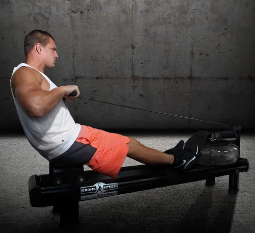 Vista 2 de WaterRower Máquina de remo de agua Gronk Fitness M1 Hi Rise Edición limitada Máquina de entrenamiento cardiovascular de bajo impacto Remo