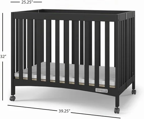 Vista 6 de Child Craft London - Mini cuna portátil plegable y compacta con colchón de cuna de 2 pulgadas y 2 ruedas de bloqueo fáciles de enrollar