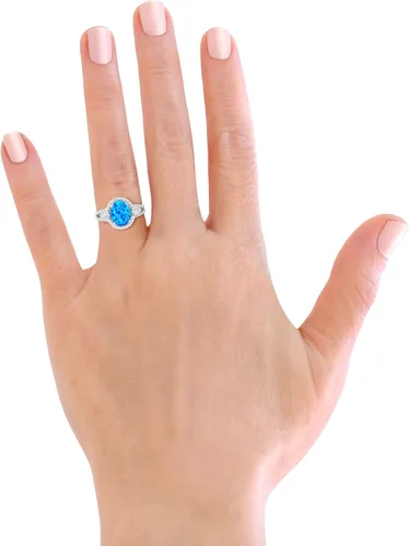Vista 4 de Savlano Anillo de ópalo azul ovalado chapado en oro blanco de 14 quilates con circonita cúbica para mujeres y niñas, viene con una caja de regalo