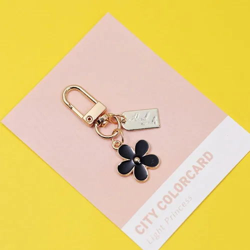 Vista 3 de 4 llaveros de flores lindo bolso llavero personalizado llavero dorado para mujeres niñas coche regalo creativo