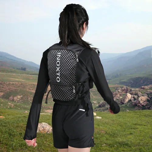 Vista 7 de INOXTO Running Hydration Vest Backpack,Lightweight Insulated Pack with 1.5L Water Bladder Bag Daypack for Trail Hiking Running Cycling Race Marathon