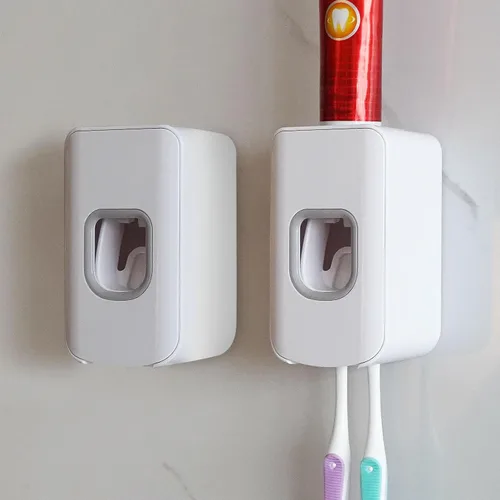 Vista 22 de Soporte de plástico para cepillos de dientes de 2 ranuras y dispensador de pasta de dientes montado en la pared, exprimidor automático de pasta