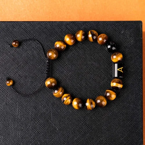 Vista 5 de FRG Brazalete con letra inicial del nombre, hecho a mano, las cuentas son de ónix negro u ojo de tigre, la cuerda es trenzada, un brazalete lleno