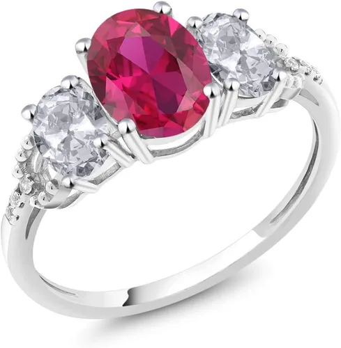 Vista 52 de Anillo de compromiso ovalado de oro blanco de 10 quilates con piedra natal y topacio blanco de 3 piedras con detalles de diamante Centro de 0.315