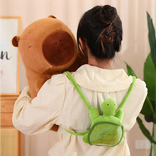 Vista 2 de JPORSHU Capybara - Juguete de peluche de 10 pulgadas con mochila de tortuga, animal de peluche Kawaii Capybara y regalos de decoración del hogar