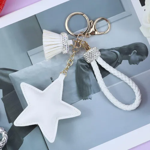 Vista 9 de Llavero para mujer con diamantes de imitación con purpurina, bonitos llaveros de estrella para niñas, bolso de cuero, llaveros de coche