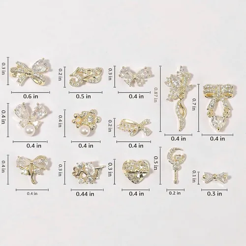 Vista 5 de Dijes y gemas para uñas, circonita de cobre dorado, múltiples formas 3D, diamantes de imitación de metal de lujo para uñas, 14 piezas 13 dijes