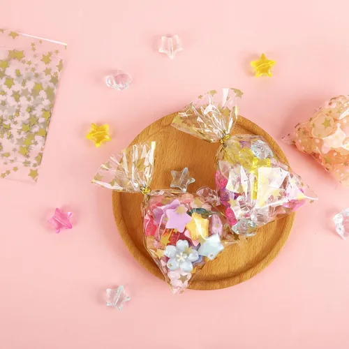 Vista 4 de 100 bolsas de celofán, bolsas de celofán transparente impresas con estrellas doradas de 3 x 5 pulgadas, 100 lazos giratorios, para envolver regalos