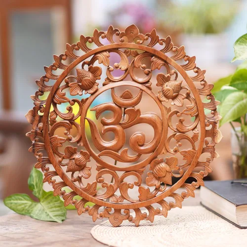 Vista 2 de NOVICA Panel de relieve de madera Om Corona floral hecho a mano