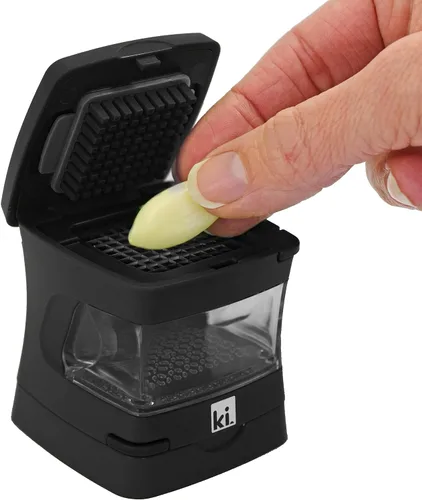 Vista 7 de Prensa de ajo Garlic-A-Peel, trituradora, cortador, picadora y contenedor de almacenamiento - Incluye pelador de ajo de silicona - Fácil de limpiar