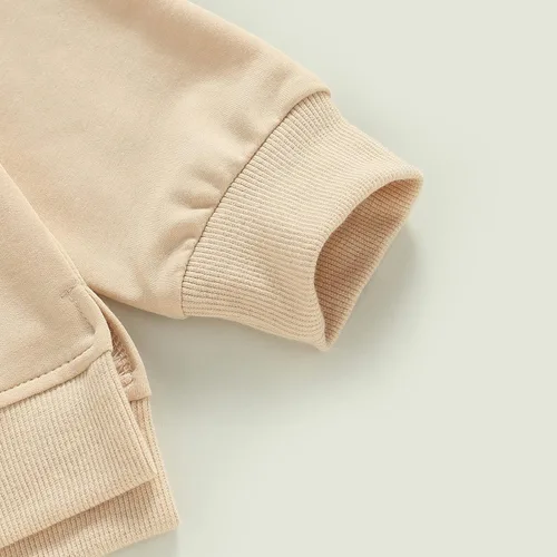 Vista 34 de Sudadera unisex de algodón de color sólido para bebé, camiseta de manga larga con cuello redondo