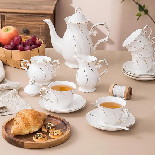 Vista 3 de Agyiuns Juego de té de 21 piezas de tazas de té y platillos de cerámica, juego de 6 con azúcar y crema y tetera, juego de tetera para adultos