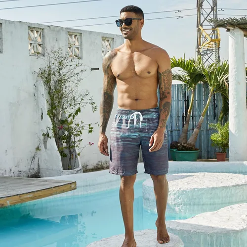 Vista 2 de UNICOMIDEA Bañador para hombre con forro de compresión de 9 pulgadas de largo