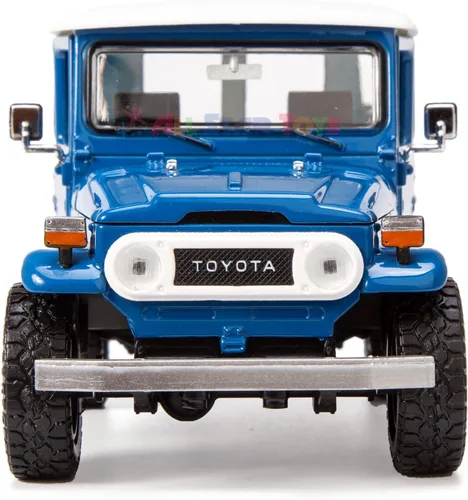 Vista 6 de All Star Toys Exclusivo Toyota Land Cruiser FJ40 Royal Blue con ruedas todoterreno personalizadas 1/24 modelo fundido a presión por Motormax 79323