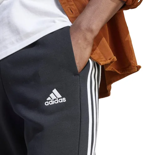 Vista 5 de adidas Pantalones Essentials de forro polar con puños cónicos de 3 rayas para hombre