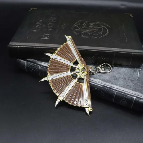 Vista 4 de crafthand Llavero de metal Loba Heirloom Mini Fan Metal Colgante Figura Decoración de Escritorio Mochila Colgante Suministros de Fiesta Regalo, Oro