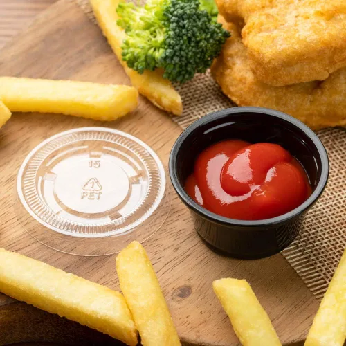 Vista 3 de Restaurantware RW Base - Tazas de salsa de 0.8 onzas, 2000 tazas de condimento aptas para microondas, resistentes a las grietas, desechables de Negro
