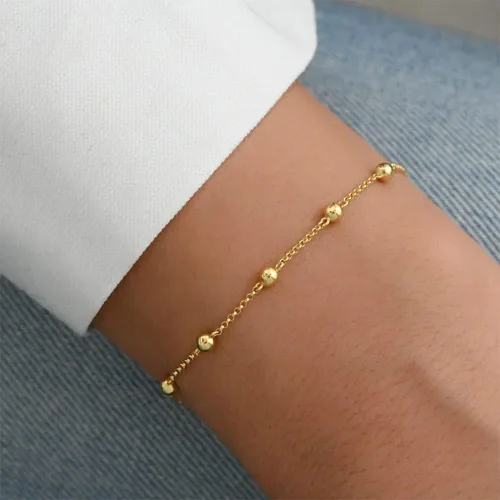 Vista 5 de VENOCO Pulseras de oro para mujer, delicadas pulseras de cuentas de oro de 14 quilates, conjuntos de pulseras de espiga ajustables en capas