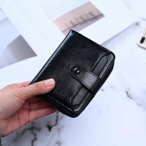 Vista 2 de Billetera pequeña para mujer con bloqueo RFID, cierre de cuero, bolsillo para monedas, tarjetero, con ventana de identificación, Negro