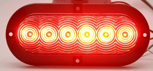Vista 3 de Par de luces LED ovaladas transparentes rojas de 6 pulgadas, luces traseras de parada, montaje en superficie, remolque, camión, RV, fabricadas