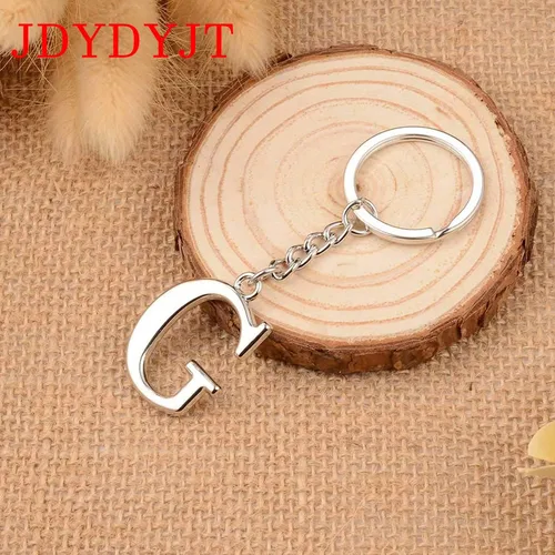 Vista 3 de Llavero de letra inicial de plata para hombres y mujeres, llavero personalizado con monograma del alfabeto para llaves de coche