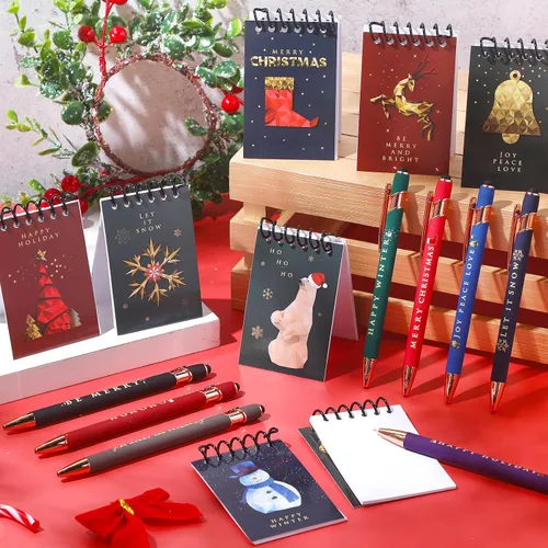 Vista 3 de Qeeenar 48 piezas de recuerdos de fiesta de Navidad, 24 mini bloc de notas en espiral de Navidad y 24 bolígrafos retráctiles de Papá Noel