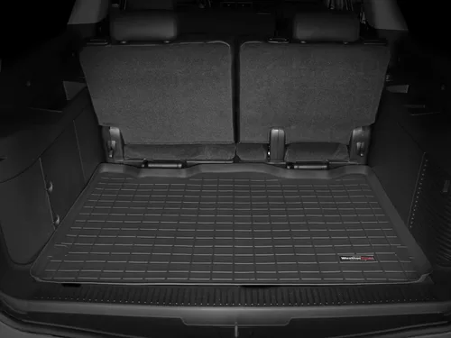 Vista 2 de WeatherTech tapetes para piso de compartimiento de carga detrás del tercer asiento, negras. Negro