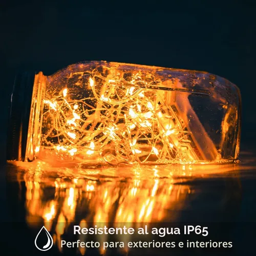Vista 4 de Paquete de 12 luces de hadas Yiaht que funcionan con pilas, cable plateado impermeable de 7 pies, 20 luces LED de luciérnaga, estrellas y luna