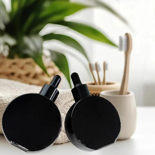 Vista 3 de Botellas transparentes con cuentagotas de 2 onzas, 6 botellas de vidrio plano redondas transparentes con cuentagotas para ojos, para sueros de Negro