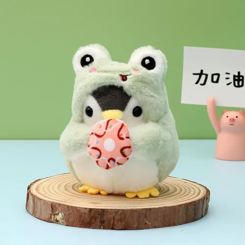 Vista 5 de Lindo llavero de pingüino Kawaii con diseño de pingüino de peluche para hombres, mujeres, niños. Colgantes de mochila..
