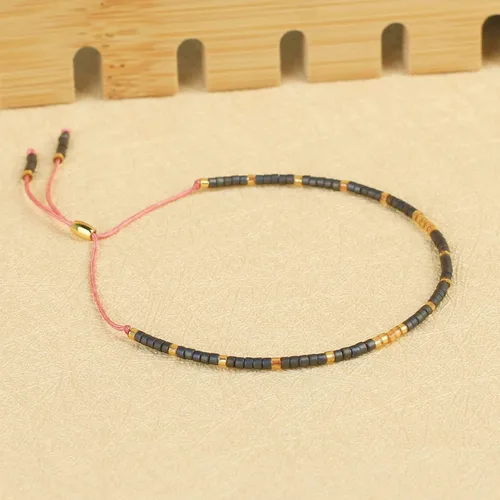 Vista 4 de KELITCH 10 pulseras elásticas de la amistad con borlas