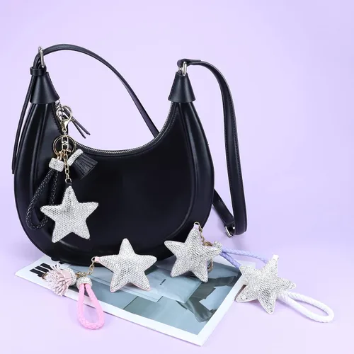 Vista 6 de Llavero para mujer con diamantes de imitación con purpurina, bonitos llaveros de estrella para niñas, bolso de cuero, llaveros de coche